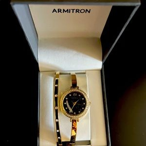 Armitron watch and bracelet set- watch still has glass protector on it.